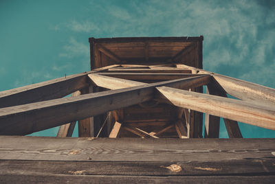 Wooden structure against sky