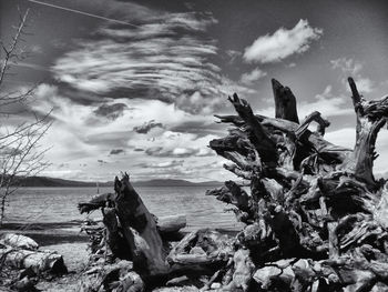 Scenic view of sea against cloudy sky