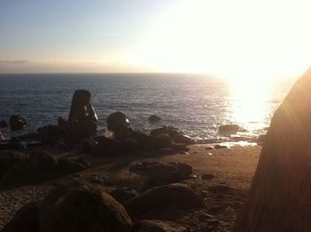 Scenic view of sea at sunset