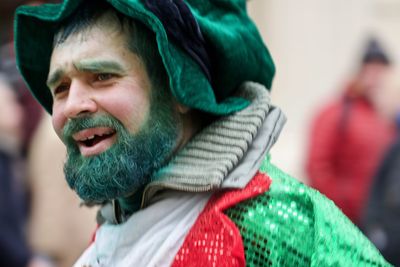 Close-up portrait of smiling man in winter