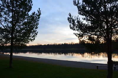 Scenic view of lake against sky during sunset