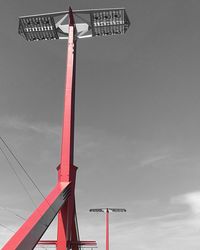 Low angle view of windmill against sky