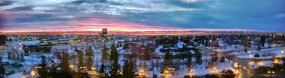 City lit up at sunset
