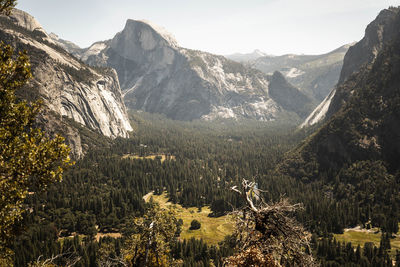 Scenic view of landscape and mountains against sky