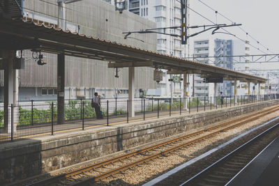 Railroad station platform against sky