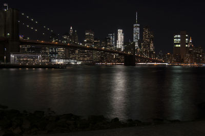 Illuminated city at waterfront