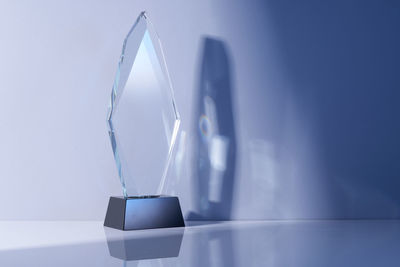 Close up of glass or crystal trophy