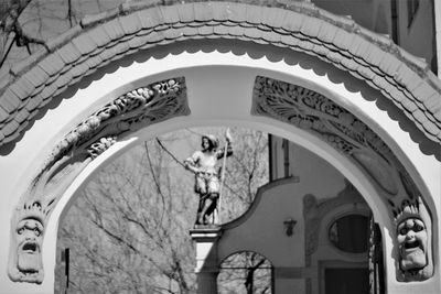 Low angle view of cross on building