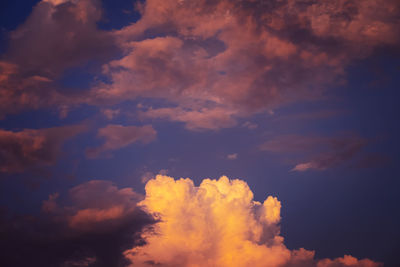 Low angle view of dramatic sky during sunset