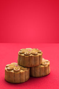 Close-up of cookies against red background