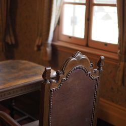 Close-up of lamp on table at home