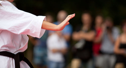 Close-up of woman against blurred background