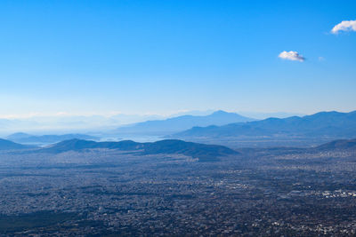 Scenic view of landscape against cloudy sky