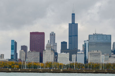 Skyscrapers in city against sky