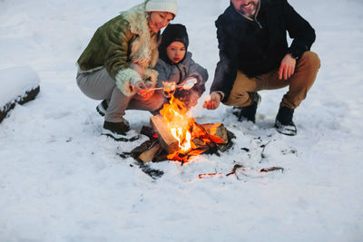 High angle view of people on snow