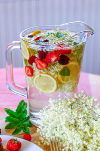 Close-up of glass of juice with drink on table