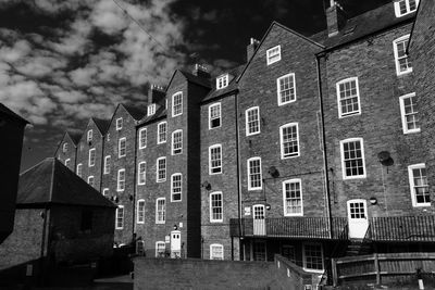 Low angle view of houses against sky