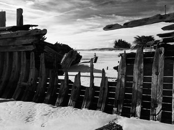View of beach against cloudy sky