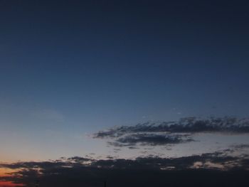 Scenic view of cloudy sky at sunset