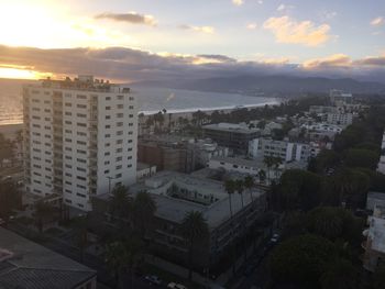 High angle view of cityscape against sky during sunset