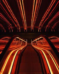 Illuminated light on escalator at night in new york city 