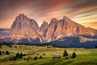 Scenic view of mountains against sky during sunset