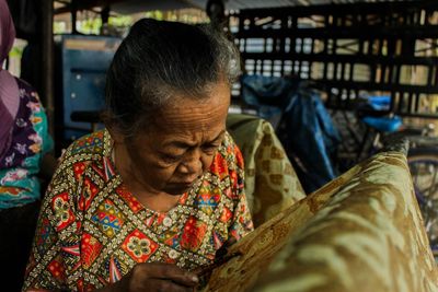 Woman holding textile