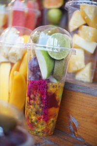 Close-up of fruits in glass on table