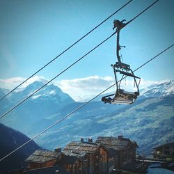 Low angle view of overhead cable car