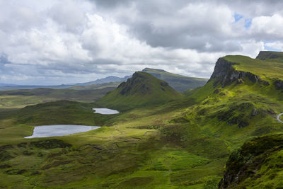 Lochs, blue sky with clouds in quiraing isle of skye scotland