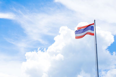 Low angle view of thai flag against sky