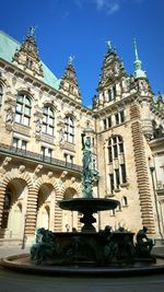 Low angle view of building against blue sky