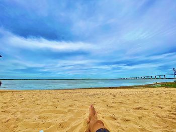 Low section of person on beach