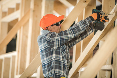 Carpenter working at construction site