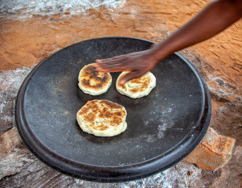 High angle view of man cooking in pan