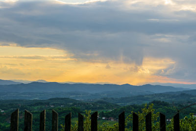 Scenic view of landscape against sky during sunset