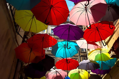 Multi colored umbrellas on wet umbrella