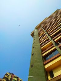 Low angle view of buildings against clear sky