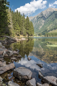 Scenic view of lake by mountain