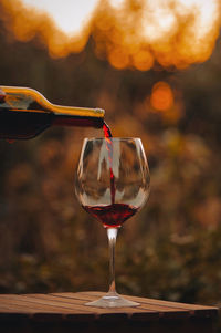 Close-up of wineglass on table