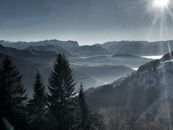 Scenic view of mountains against sky during winter