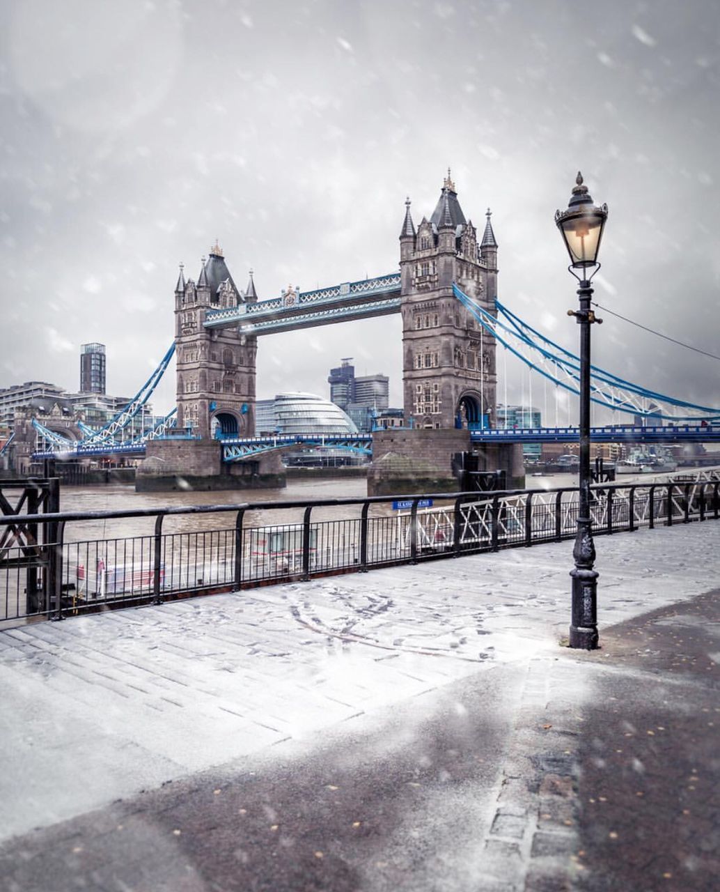 architecture, bridge - man made structure, built structure, connection, city, building exterior, travel destinations, suspension bridge, tower, river, sky, bascule bridge, outdoors, transportation, water, day, no people, cityscape