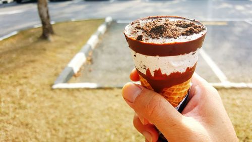 Chocolate ice cream on sunny day