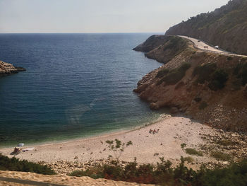 High angle view of sea shore against sky