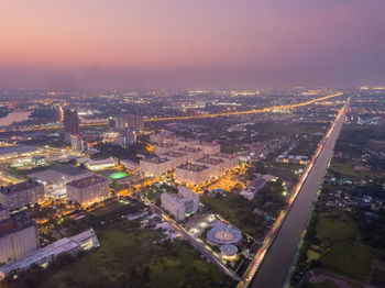 High angle view of illuminated buildings in city