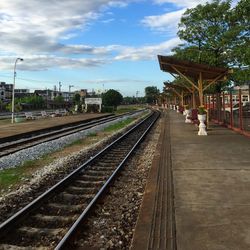 Railroad station platform against sky