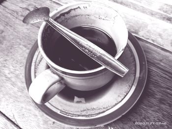 Close-up of coffee cup on table