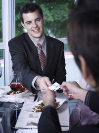 Colleagues at restaurant during meeting