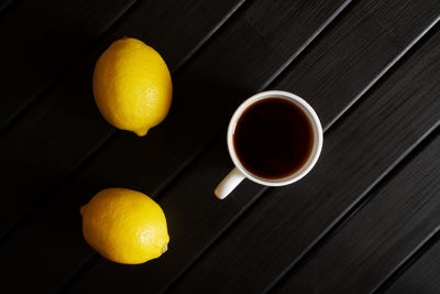 High angle view of orange tea on table