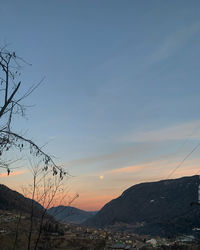 Scenic view of mountains against sky during sunset